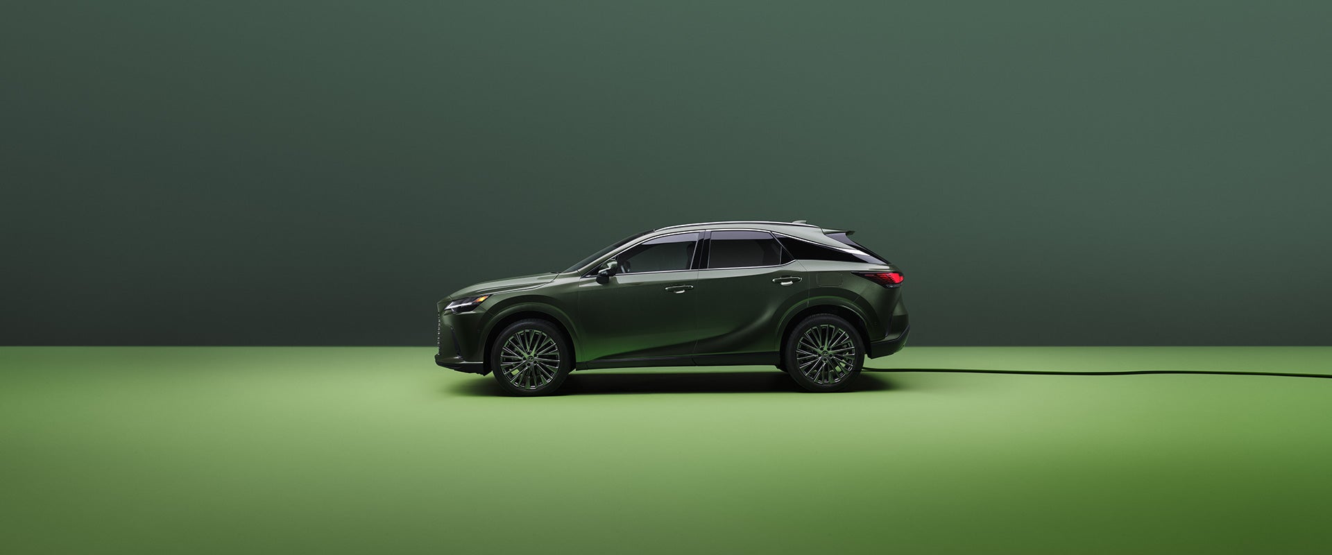 RX 450 Hybrid Plus Luxury all-wheel drive shown in Nori Green Pearl. 